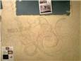 Wall sketches of Virgo, Lupus, Leo, Pavo, Cetus, Argo and Hydra.

Sketches on paper are done, now it's time to put them on the wall. I used a couple of different sky map apps on my phone to place the constellations in the room. One of the apps allowed you to set a date and time in the future so I picked Arianna's due date and used that as my reference. A little fudging had to be done in order to get some of the constellations to fit up on the wall (the app showed their placement on the floor).

More artistic license was taken with Cetus, Argo and Hydra. While doing research I had seen an old star map where the sea monster Cetus was drawn as a whale. As this mural is for a baby's room, I didn't want scary, monsters images on the walls so the interpretation of a whale was perfect.

Argo Navis is an ancient constellation of the southern hemisphere that has since been broken up into three separate constellations (Carnia, Vela and Puppis). As Madeline's room has a ship, I wanted one in Arianna's room too. I'm also enamored with the story/poem of "Wynken, Blynken, and Nod" which mixes aspects of the stars with the sea. Argo seemed like an excellent constellation to add and made a nice way to interpret a nearby constellation Hydra. Again, I didn't want to add a multi-headed monster to a child's room so an octopus seemed like a good compromise. If she ever asks we planned to tell her the giant octopus is giving the ship a hug.