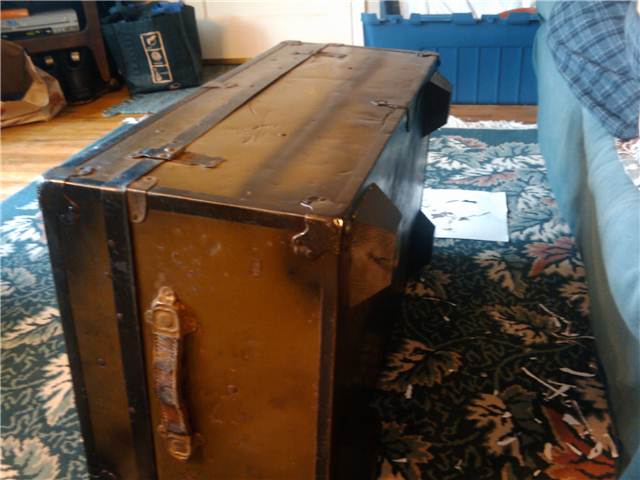 The trunk before adding decoupage. I cleaned the trunk out and spray painted all the rusty bits. I also glued on some wooden feet.